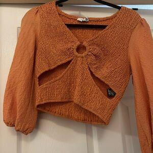 Lush Terracotta Smocked Blouse with Cut-Out Design